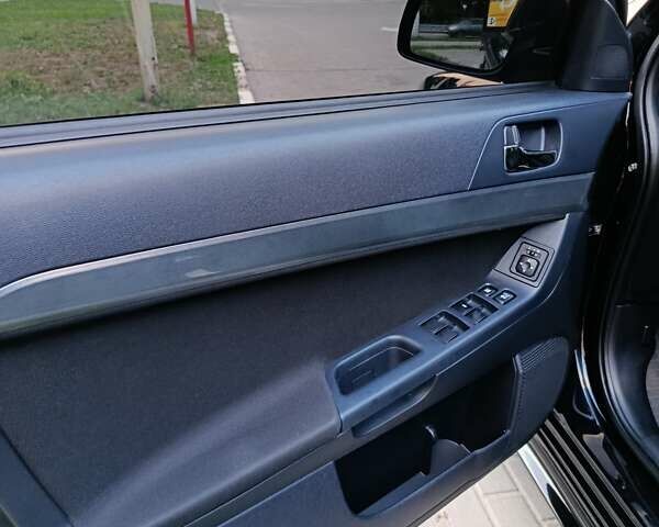 Мицубиси Лансер 2008 в Днепре (Днепропетровске) на Automoto.ua Черный Мицубиси Лансер, объемом двигателя 2 л и пробегом 196 тыс. км за 6900 $, фото 32 на Automoto.ua