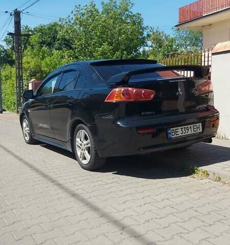 Чорний Міцубісі Lancer, об'ємом двигуна 2 л та пробігом 257 тис. км за 5500 $, фото 4 на Automoto.ua