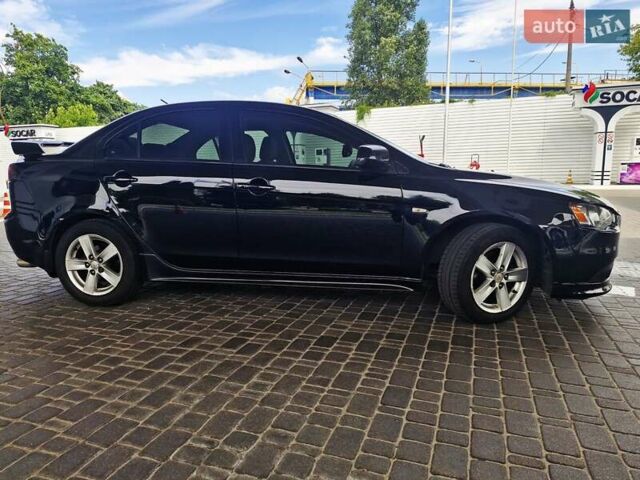 Чорний Міцубісі Lancer, об'ємом двигуна 2 л та пробігом 240 тис. км за 7850 $, фото 21 на Automoto.ua