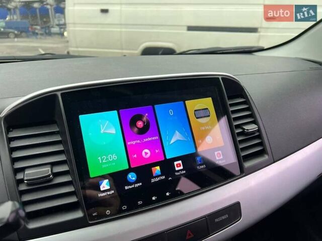 Черный Мицубиси Лансер, объемом двигателя 1.5 л и пробегом 225 тыс. км за 5100 $, фото 20 на Automoto.ua