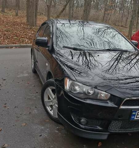 Чорний Міцубісі Lancer, об'ємом двигуна 2 л та пробігом 302 тис. км за 7200 $, фото 6 на Automoto.ua