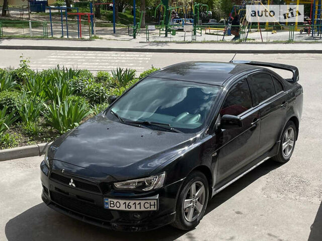 Чорний Міцубісі Lancer, об'ємом двигуна 2 л та пробігом 178 тис. км за 7500 $, фото 1 на Automoto.ua