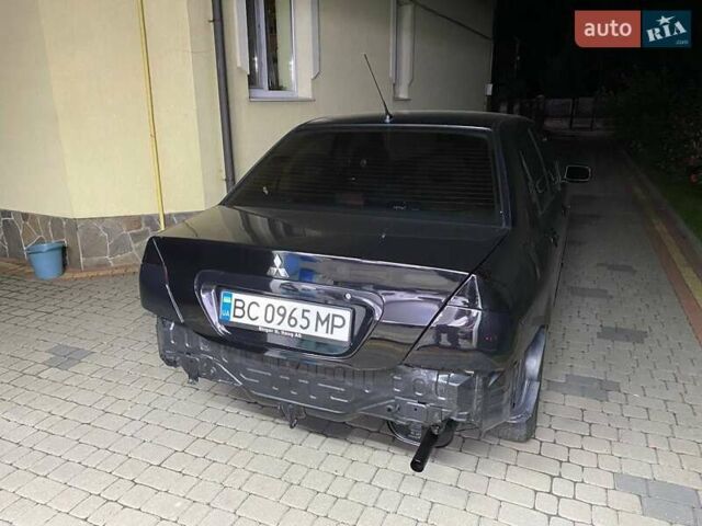 Мицубиси Лансер 2008 в Львове на Automoto.ua Черный Мицубиси Лансер, объемом двигателя 1.58 л и пробегом 200 тыс. км за 5200 $, фото 49 на Automoto.ua
