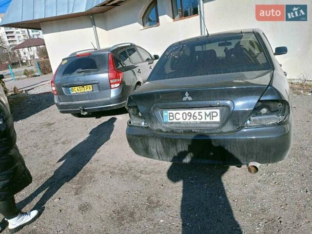 Мицубиси Лансер 2008 в Львове на Automoto.ua Черный Мицубиси Лансер, объемом двигателя 1.58 л и пробегом 200 тыс. км за 5200 $, фото 51 на Automoto.ua