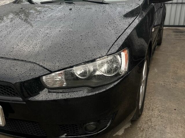Чорний Міцубісі Lancer, об'ємом двигуна 2 л та пробігом 219 тис. км за 6800 $, фото 2 на Automoto.ua