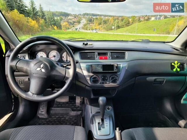 Міцубісі Lancer 2008 у Тернополі на Automoto.ua Чорний Міцубісі Lancer, об'ємом двигуна 1.58 л та пробігом 182 тис. км за 5600 $, фото 17 на Automoto.ua