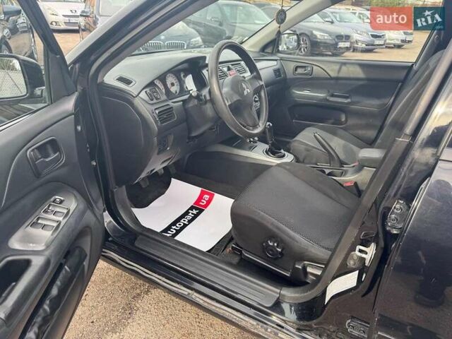 Мицубиси Лансер 2008 в Запорожье на Automoto.ua Черный Мицубиси Лансер, объемом двигателя 1.6 л и пробегом 316 тыс. км за 4290 $, фото 10 на Automoto.ua