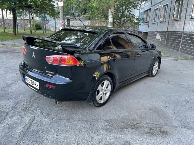 Чорний Міцубісі Lancer, об'ємом двигуна 2 л та пробігом 215 тис. км за 7700 $, фото 3 на Automoto.ua