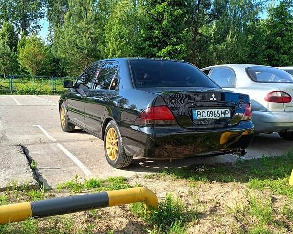Мицубиси Лансер 2008 в Львове на Automoto.ua Черный Мицубиси Лансер, объемом двигателя 1.58 л и пробегом 200 тыс. км за 5200 $, фото 153 на Automoto.ua