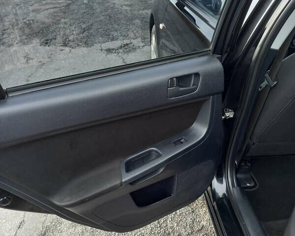 Чорний Міцубісі Lancer, об'ємом двигуна 1.5 л та пробігом 160 тис. км за 5850 $, фото 5 на Automoto.ua