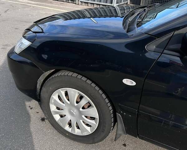 Чорний Міцубісі Lancer, об'ємом двигуна 1.6 л та пробігом 310 тис. км за 3500 $, фото 5 на Automoto.ua