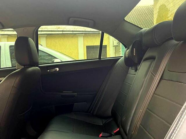Чорний Міцубісі Lancer, об'ємом двигуна 2 л та пробігом 255 тис. км за 7200 $, фото 8 на Automoto.ua