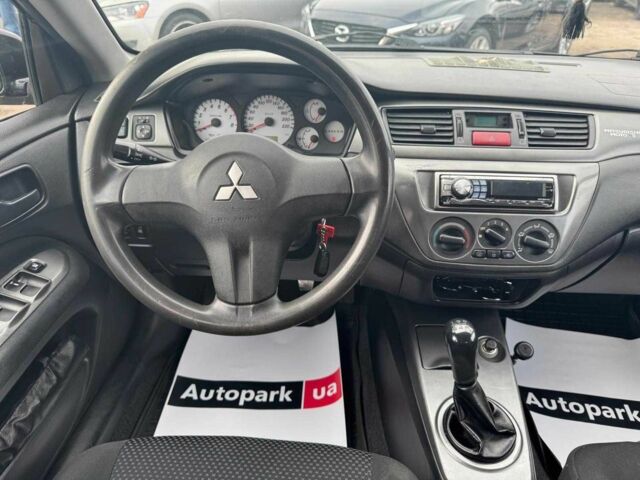 Мицубиси Лансер 2008 в Запорожье на Automoto.ua Черный Мицубиси Лансер, объемом двигателя 1.6 л и пробегом 316 тыс. км за 4290 $, фото 9 на Automoto.ua