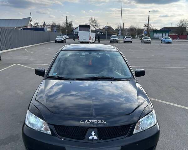 Чорний Міцубісі Lancer, об'ємом двигуна 1.6 л та пробігом 310 тис. км за 3500 $, фото 26 на Automoto.ua
