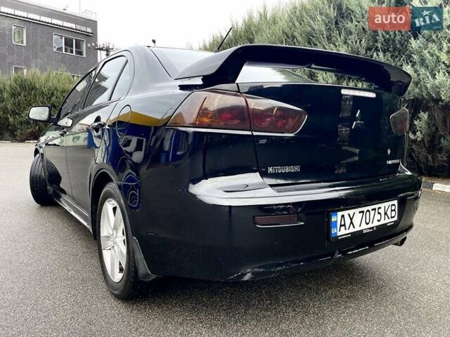 Чорний Міцубісі Lancer, об'ємом двигуна 2 л та пробігом 217 тис. км за 5800 $, фото 7 на Automoto.ua