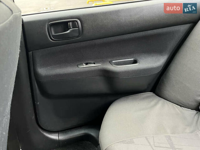 Чорний Міцубісі Lancer, об'ємом двигуна 1.58 л та пробігом 192 тис. км за 4500 $, фото 15 на Automoto.ua