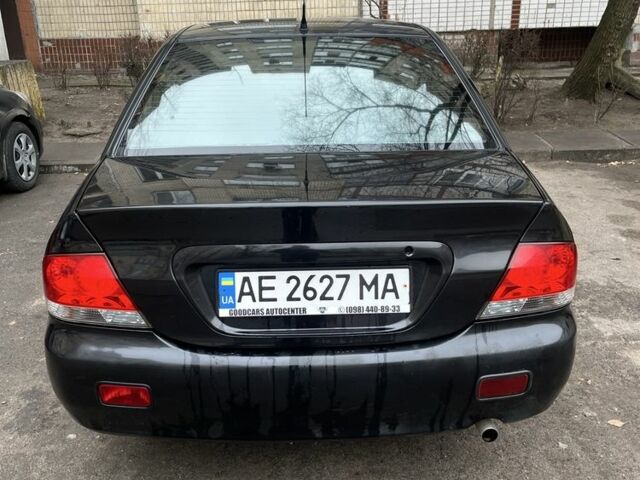 Чорний Міцубісі Lancer, об'ємом двигуна 1.6 л та пробігом 250 тис. км за 3900 $, фото 5 на Automoto.ua