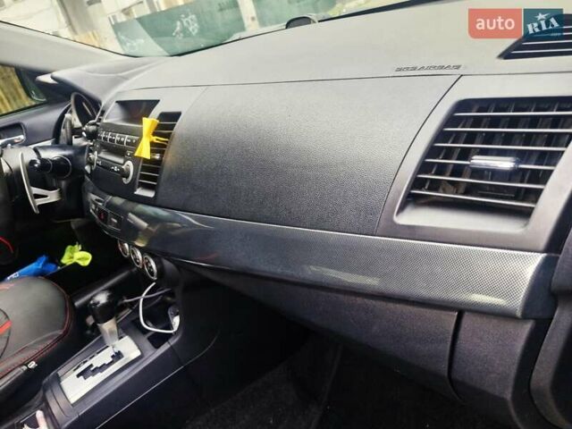 Чорний Міцубісі Lancer, об'ємом двигуна 2 л та пробігом 240 тис. км за 7850 $, фото 23 на Automoto.ua