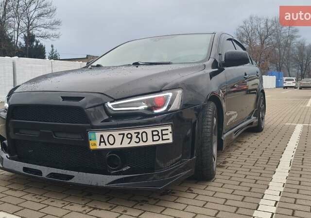 Чорний Міцубісі Lancer, об'ємом двигуна 2 л та пробігом 160 тис. км за 8000 $, фото 9 на Automoto.ua