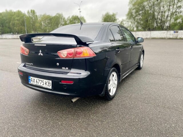 Чорний Міцубісі Lancer, об'ємом двигуна 0.15 л та пробігом 228 тис. км за 5700 $, фото 3 на Automoto.ua