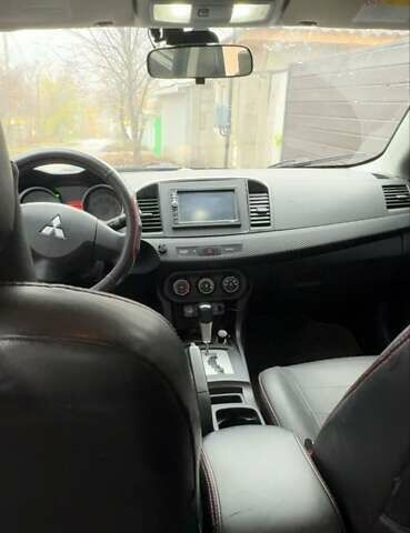 Чорний Міцубісі Lancer, об'ємом двигуна 1.5 л та пробігом 290 тис. км за 5499 $, фото 4 на Automoto.ua