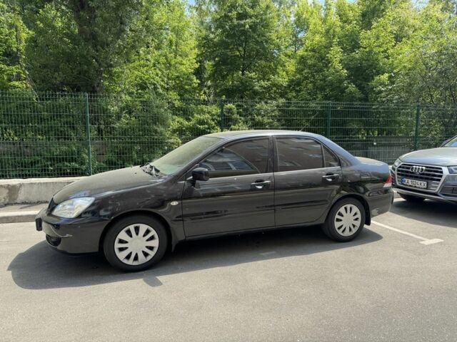 Чорний Міцубісі Lancer, об'ємом двигуна 1.6 л та пробігом 78 тис. км за 3999 $, фото 1 на Automoto.ua