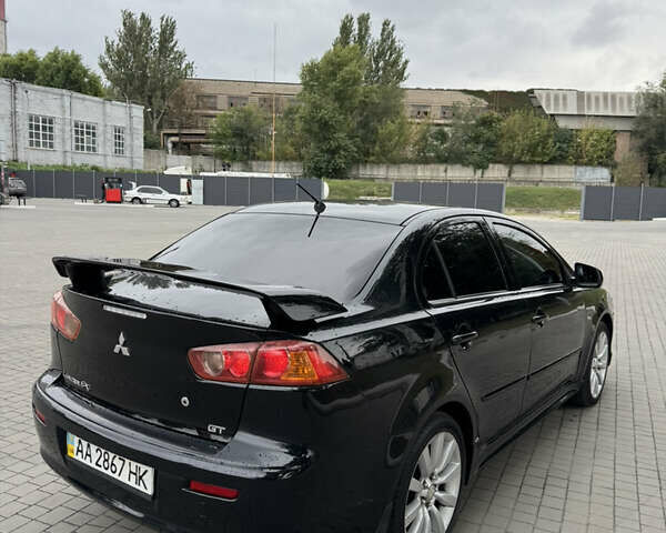 Чорний Міцубісі Lancer, об'ємом двигуна 2 л та пробігом 200 тис. км за 6800 $, фото 2 на Automoto.ua