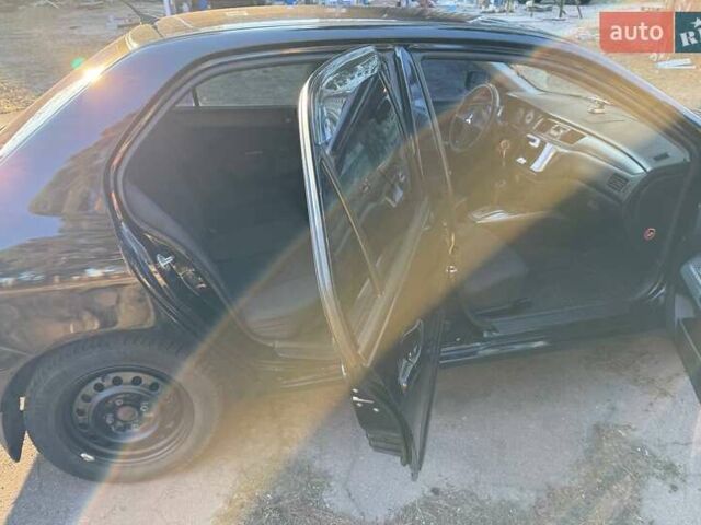 Черный Мицубиси Лансер, объемом двигателя 1.6 л и пробегом 305 тыс. км за 4200 $, фото 10 на Automoto.ua