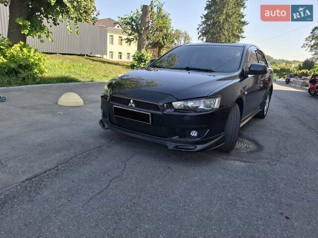 Черный Мицубиси Лансер, объемом двигателя 2 л и пробегом 230 тыс. км за 7000 $, фото 15 на Automoto.ua