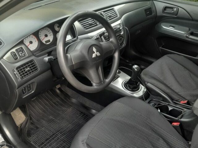 Чорний Міцубісі Lancer, об'ємом двигуна 1.6 л та пробігом 200 тис. км за 3500 $, фото 6 на Automoto.ua