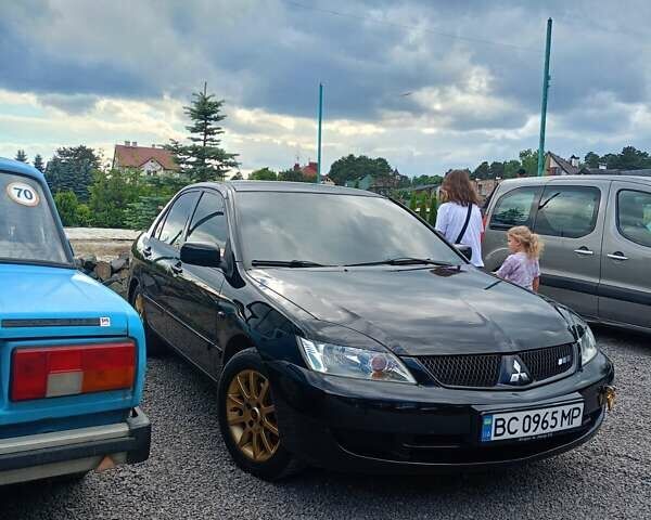 Мицубиси Лансер 2008 в Львове на Automoto.ua Черный Мицубиси Лансер, объемом двигателя 1.58 л и пробегом 200 тыс. км за 5200 $, фото 172 на Automoto.ua