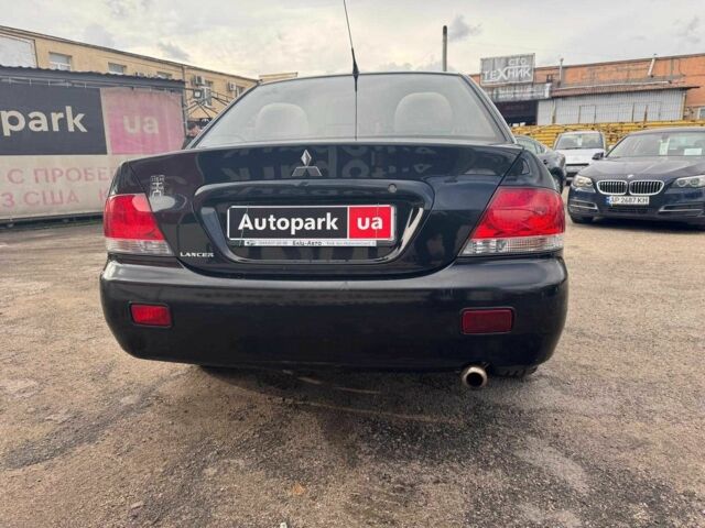 Мицубиси Лансер 2008 в Запорожье на Automoto.ua Черный Мицубиси Лансер, объемом двигателя 1.6 л и пробегом 316 тыс. км за 4290 $, фото 5 на Automoto.ua
