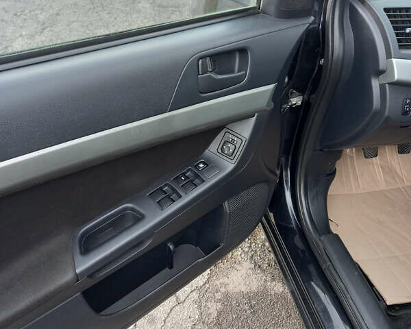 Чорний Міцубісі Lancer, об'ємом двигуна 1.5 л та пробігом 160 тис. км за 5850 $, фото 15 на Automoto.ua