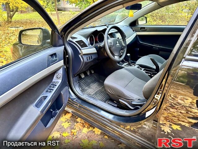 Чорний Міцубісі Lancer, об'ємом двигуна 2 л та пробігом 245 тис. км за 5500 $, фото 10 на Automoto.ua