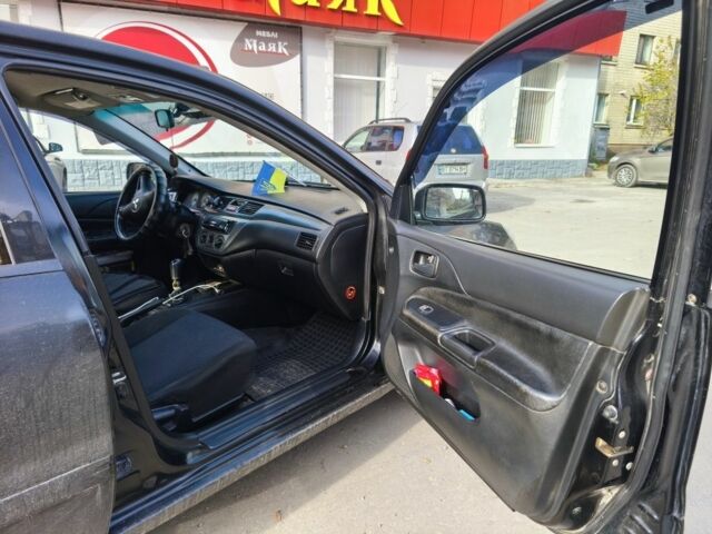 Черный Мицубиси Лансер, объемом двигателя 1.6 л и пробегом 358 тыс. км за 4300 $, фото 2 на Automoto.ua