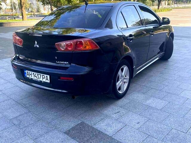 Чорний Міцубісі Lancer, об'ємом двигуна 2 л та пробігом 220 тис. км за 6300 $, фото 3 на Automoto.ua