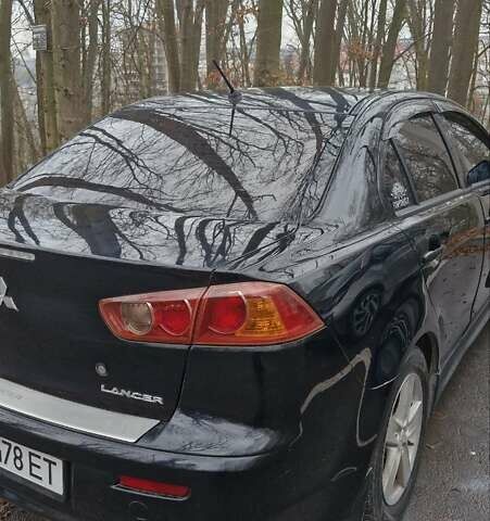 Чорний Міцубісі Lancer, об'ємом двигуна 2 л та пробігом 302 тис. км за 7200 $, фото 5 на Automoto.ua