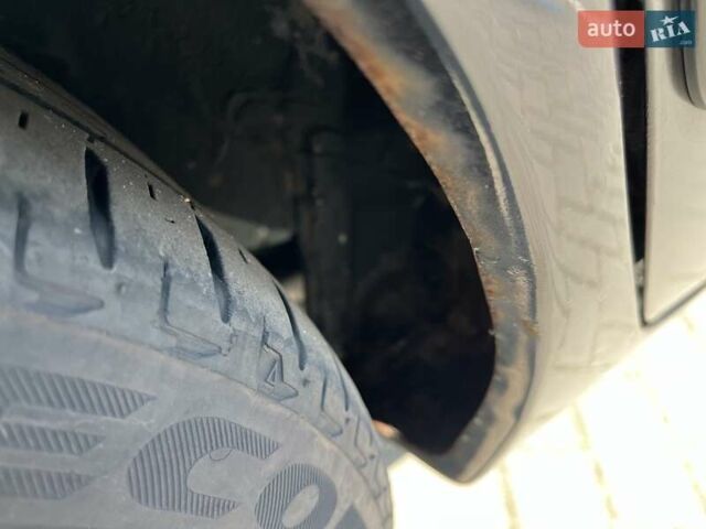 Чорний Міцубісі Lancer, об'ємом двигуна 1.6 л та пробігом 296 тис. км за 4200 $, фото 19 на Automoto.ua