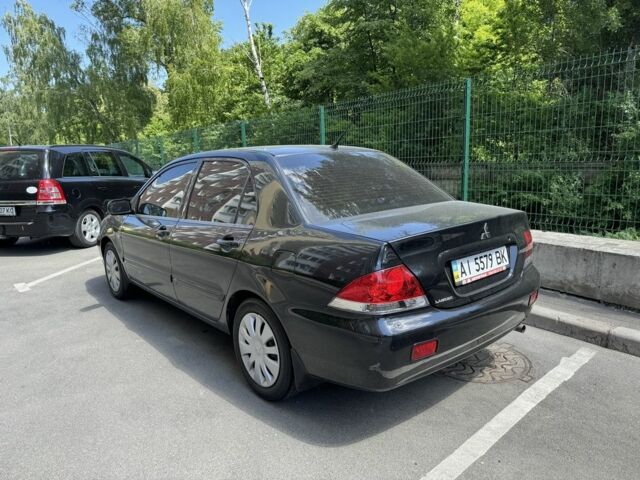 Чорний Міцубісі Lancer, об'ємом двигуна 1.6 л та пробігом 78 тис. км за 3999 $, фото 4 на Automoto.ua