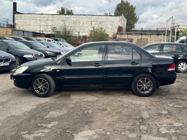 Мицубиси Лансер 2008 в Запорожье на Automoto.ua Черный Мицубиси Лансер, объемом двигателя 1.6 л и пробегом 316 тыс. км за 4290 $, фото 3 на Automoto.ua