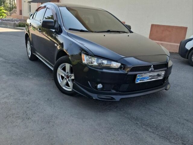 Чорний Міцубісі Lancer, об'ємом двигуна 2 л та пробігом 230 тис. км за 6650 $, фото 8 на Automoto.ua