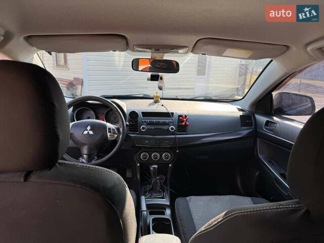 Чорний Міцубісі Lancer, об'ємом двигуна 2 л та пробігом 150 тис. км за 6500 $, фото 10 на Automoto.ua