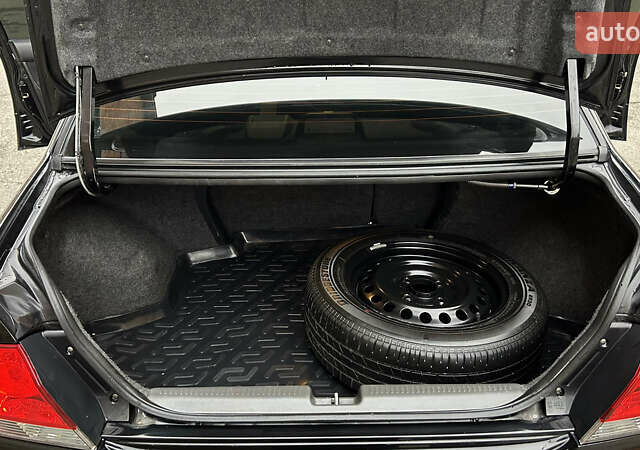 Чорний Міцубісі Lancer, об'ємом двигуна 1.58 л та пробігом 167 тис. км за 4800 $, фото 11 на Automoto.ua