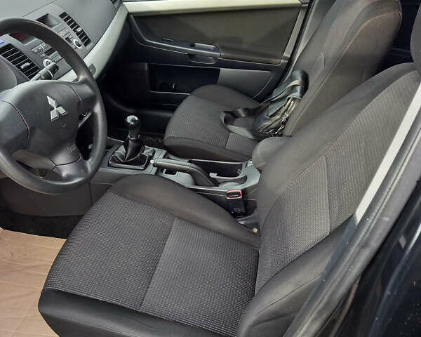 Чорний Міцубісі Lancer, об'ємом двигуна 1.5 л та пробігом 160 тис. км за 5850 $, фото 12 на Automoto.ua
