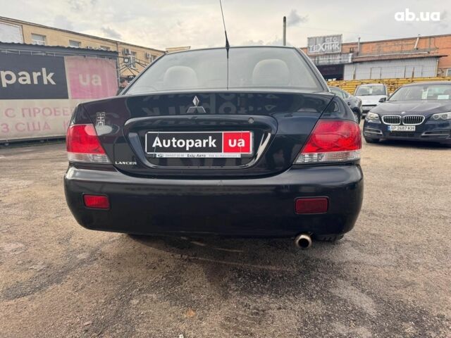 Мицубиси Лансер 2008 в Запорожье на Automoto.ua Черный Мицубиси Лансер, объемом двигателя 1.6 л и пробегом 316 тыс. км за 4290 $, фото 5 на Automoto.ua