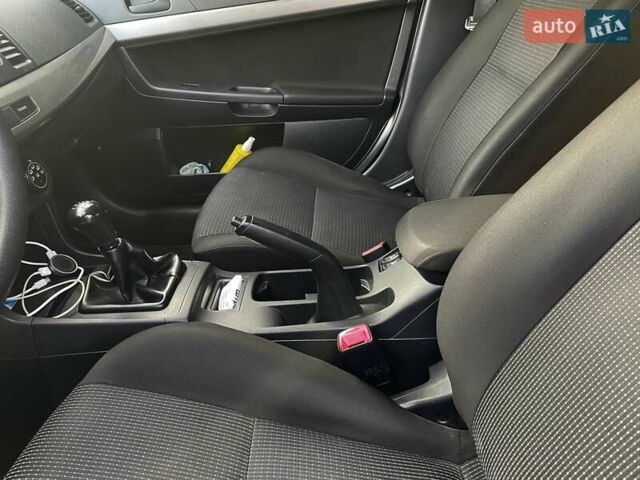 Чорний Міцубісі Lancer, об'ємом двигуна 1.5 л та пробігом 184 тис. км за 6000 $, фото 10 на Automoto.ua