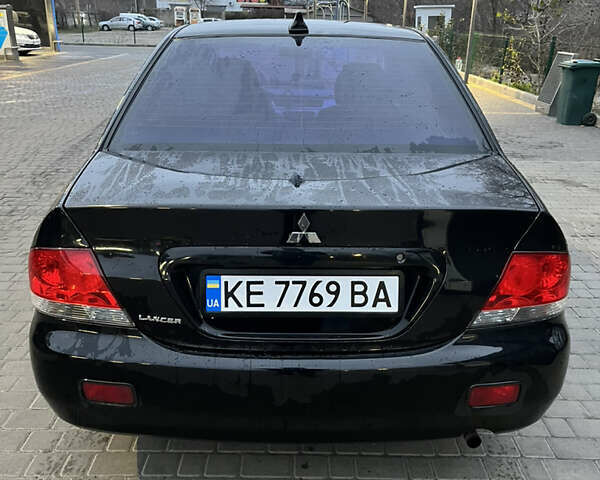 Чорний Міцубісі Lancer, об'ємом двигуна 1.6 л та пробігом 277 тис. км за 3900 $, фото 8 на Automoto.ua