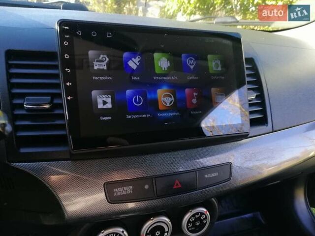 Мицубиси Лансер 2008 в Киеве на Automoto.ua Черный Мицубиси Лансер, объемом двигателя 2 л и пробегом 196 тыс. км за 5500 $, фото 12 на Automoto.ua