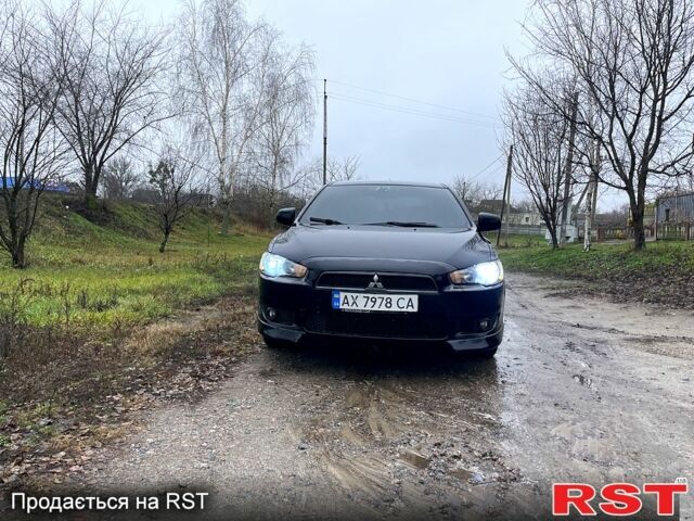 Черный Мицубиси Лансер, объемом двигателя 2 л и пробегом 226 тыс. км за 6600 $, фото 8 на Automoto.ua