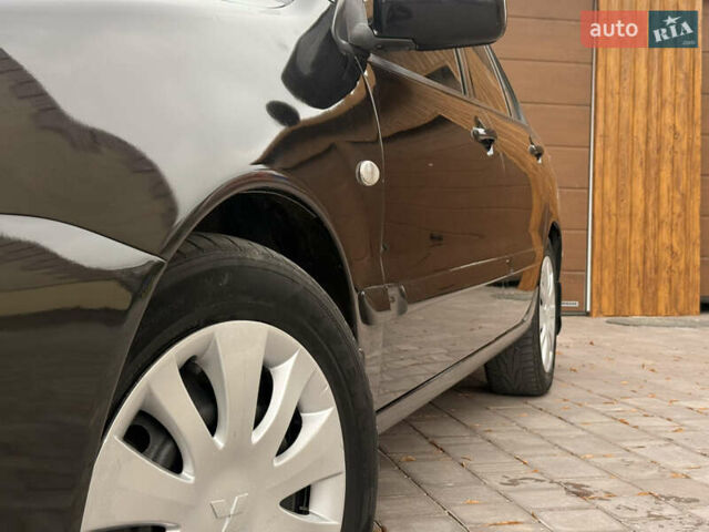 Чорний Міцубісі Lancer, об'ємом двигуна 1.6 л та пробігом 265 тис. км за 4700 $, фото 3 на Automoto.ua